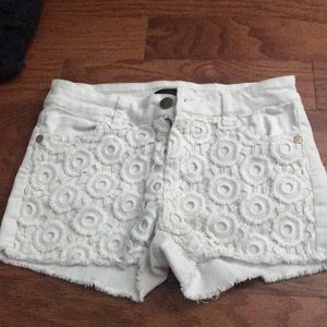 White flower lace shorts.